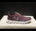 Maroon tennis shoes