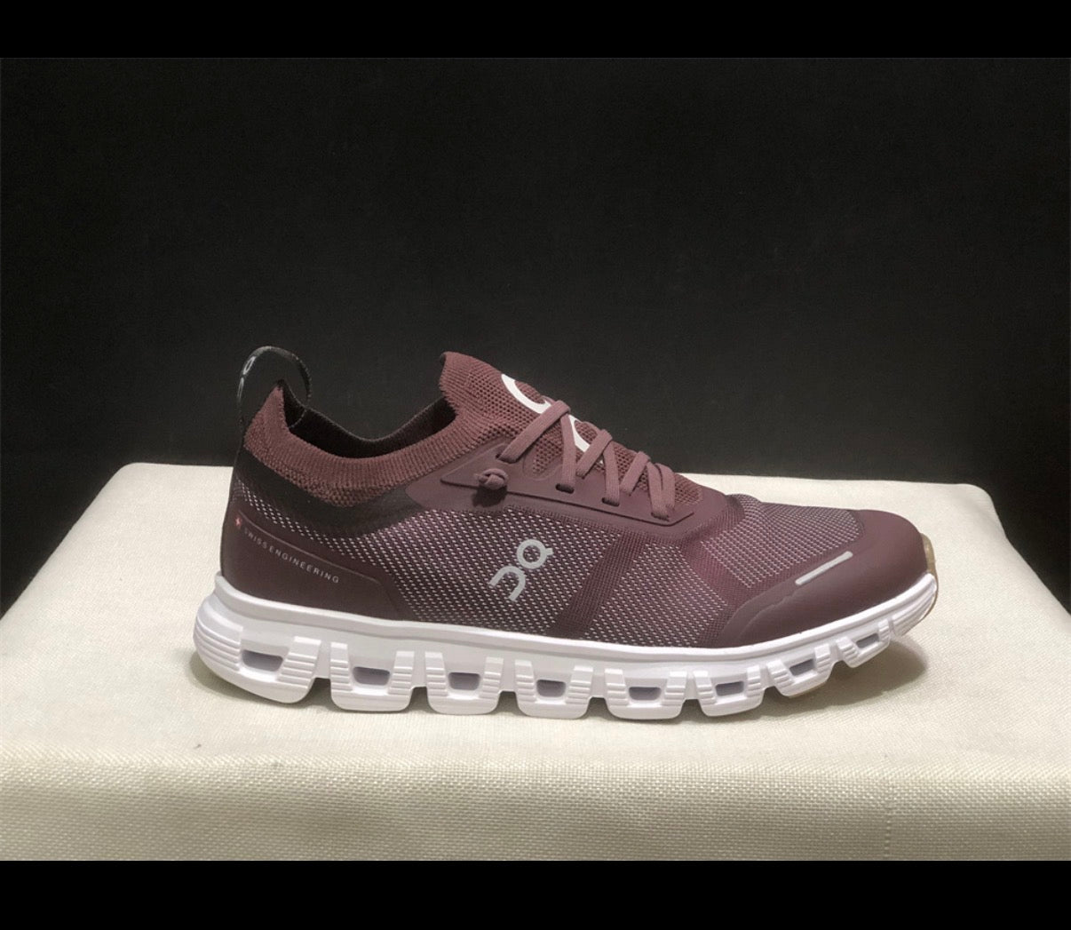 Maroon tennis shoes