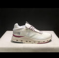White and pink/purple tennis shoes