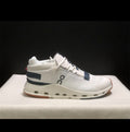 White and navy tennis shoes